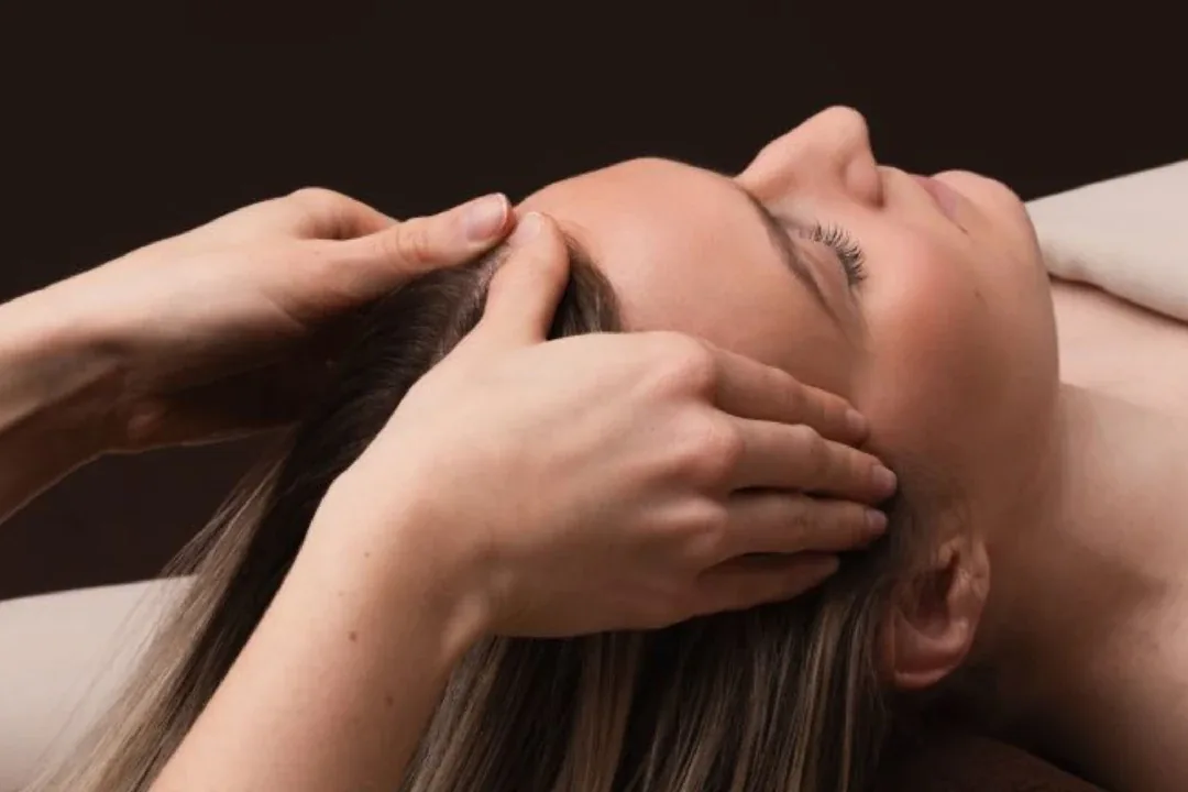 Relaxing scalp massage during a head spa